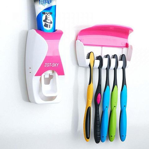 Toothpaste dispenser with holder